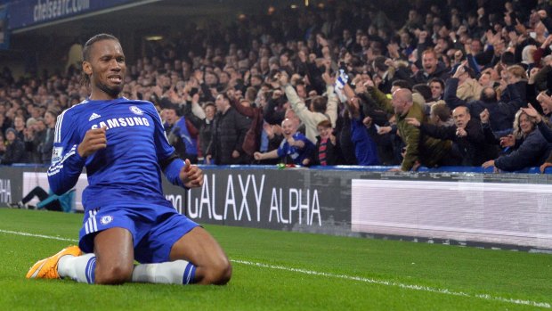 Chelsea's Ivorian striker Didier Drogba celebrates scoring at Stamford Bridge in London. 
