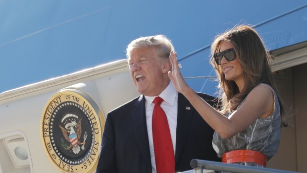 Donald Trump and First Lady Melania Trump board Air Force One.