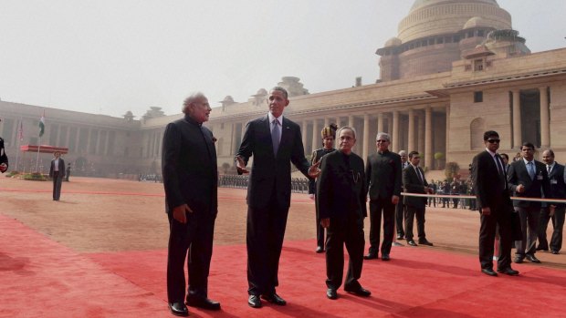 India's Prime Minister Narendra Modi, US President Barack Obama and Indian President Pranab Mukherjee at the Presidential Palace in New Delhi. 