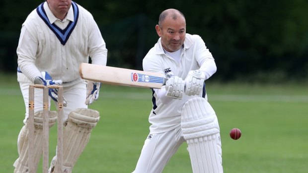 Fierce competitor: Eddie Jones bats during the Rugby Writers' cricket match against the RFU in July.