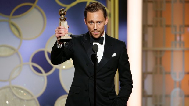 Tom Hiddleston with the award for best actor in a limited series or TV movie for <i>The Night Manager</i> at the 2017 Golden Globe Awards.
