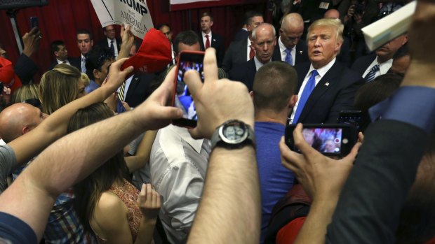 Republican presidential candidate Donald Trump greets supporters in New Jersey.