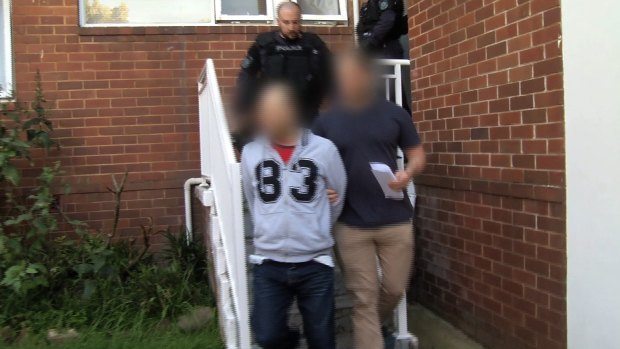 Police arrest Anslem Lee at his Dulwich Hill unit in 2015.