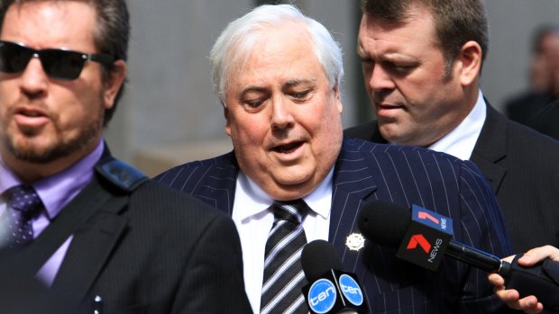 Clive Palmer arrives at Federal Court in September to answer questions about the collapse of Queensland Nickel.