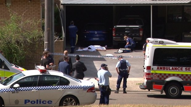 Police at the scene of Tuesday's fatal shooting. 