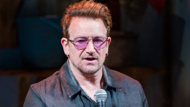 Bono laughed at the ridiculousness of being awarded Glamour magazine's Man of the Year award.