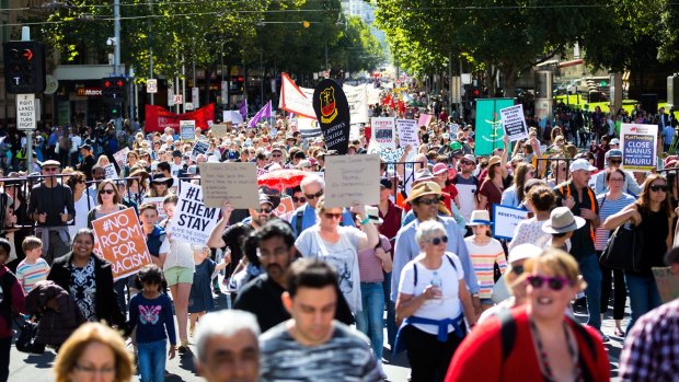 MELBOURNE, AUSTRALIA - MARCH 20:  Thousands of Melbournians rallied and marched from the State Library to the Alexandra gardens in solidarity for refugee rights on Palm Sunday on March 20, 2016 in Melbourne, Australia.  (Photo by Chris Hopkins/Fairfax Media)