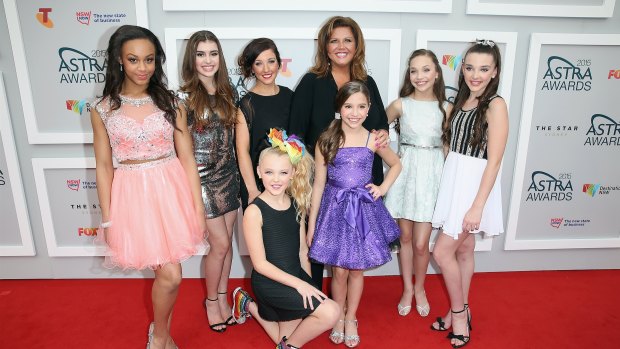 The cast of <i>Dance Moms</i> attend the Astra Awards on their second Australian tour in May 2015. Dance teacher Abby Lee Miller is pleading guilty to US federal charges regarding bankruptcy fraud and failure to declare cash following the show's first Australian tour in 2014.