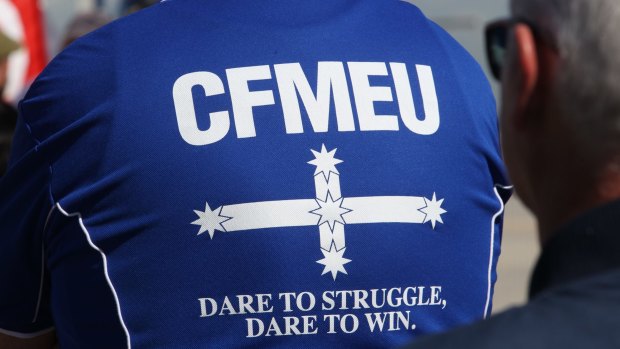 A CFMEU organiser with a history of criminal offences convinced the workplace tribunal he was "no longer fiery".