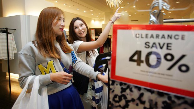 Joyce Tang (left) and Wendy Lin were among hundreds who lined up for the David Jones sale in the city.