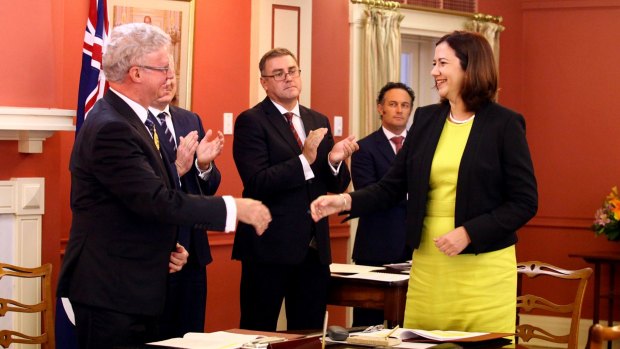 Queensland Governor Paul de Jersey, pictured swearing in Premier Annastacia Palaszczuk, has marked 12 months in office.