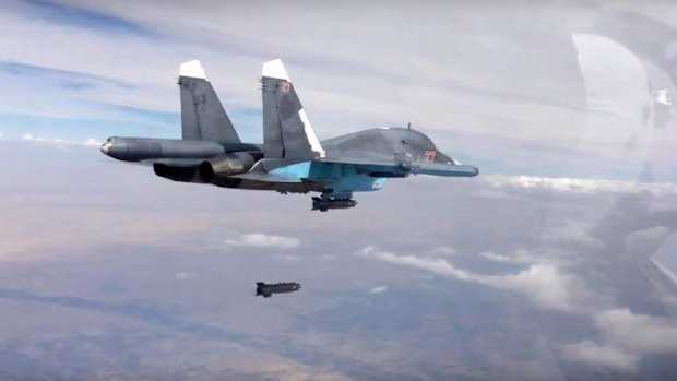 A bomb is released from a Russian Su-34 strike fighter in Syria.