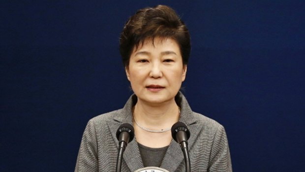 Park Geun-hye, pictured in November, is accused of colluding with long-time friend Choi Soon-sil to pressure big businesses to make contributions to non-profit foundations backing presidential initiatives.
