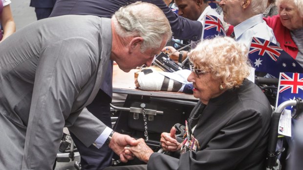 Prince Charles greets Daphne Dunne, 95, from Turramurra, in Martin Place.
