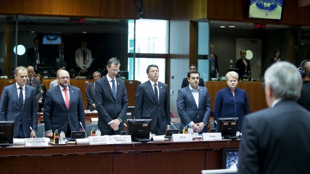 Observing a minute's silence are (from left) European Council President Donald Tusk, European Parliament President Martin Schulz, EU Council General Secretary Uwe Corsepius, Italian Prime Minister Matteo Renzi, Greek Prime Minister Alexis Tsipras and Lithuanian President Dalia Grybauskaite at a summit to address the downings.