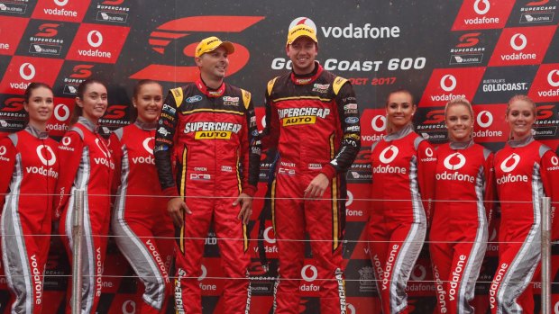 Chaz Mostert and co-driver Steve Owen of Supercheap Auto Racing celebrate winning race 21 of the Vodafone Gold Coast 600 Supercar series in the Gold Coast, Saturday, October 21, 2017. The Vodafone Gold Coast 600 Supercars event is part of the Virgin Australia Supercars Championship.  