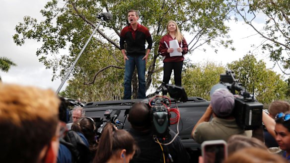 Organisers Cameron Kasky, left, and Jackie Corin address fellow students.