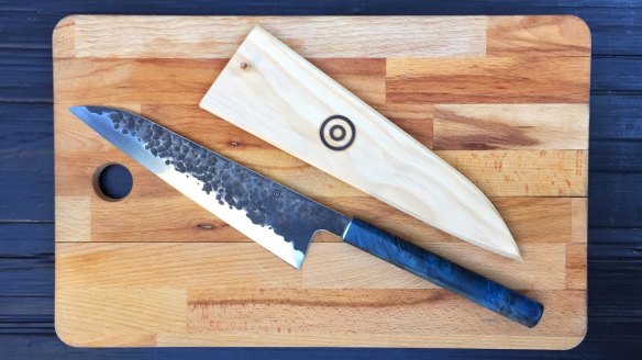 A wide bevel workhorse gyuto stainless steel from James Oatley.