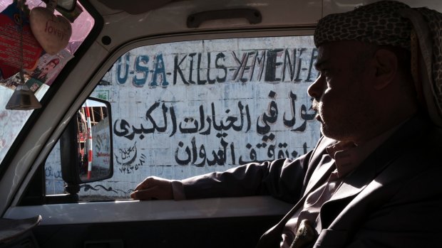 Anti-American graffiti on the street in  Yemen's capital Sanaa.