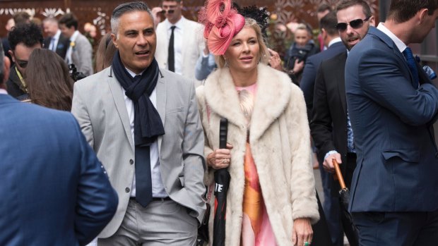 Ahmed Fahour and his wife in the Birdcage at the Melbourne Cup.