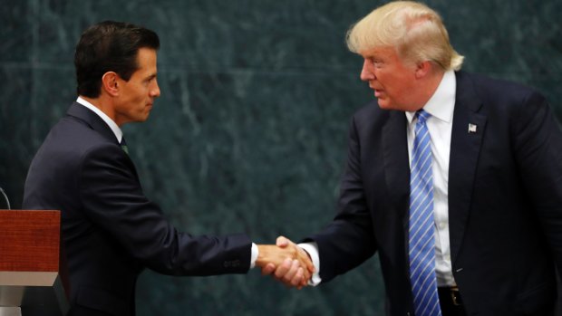 Looking presidential: Mexico President Enrique Pena Nieto and Donald Trump shake hands. 