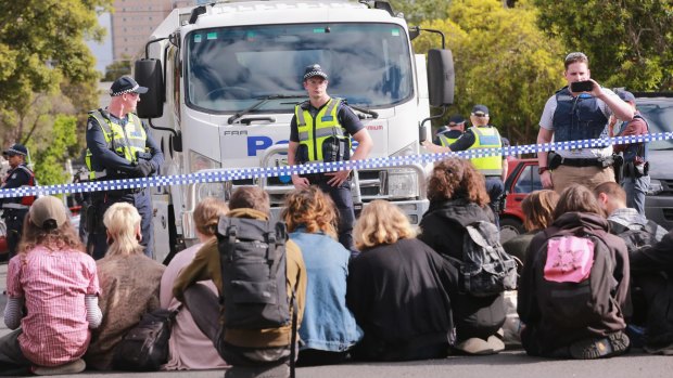 Squatters from East West Link housing in Bendigo Street, Collingwood, defy police on November 2. 