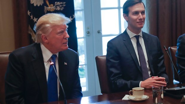 US President Donald Trump with his son-in-law and advisor, Jared Kushner, who has been charged with striking peace in the Middle East.