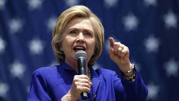 Democratic presidential candidate Hillary Clinton   called for Americans to "redouble our efforts to defend our country from threats at home and abroad".