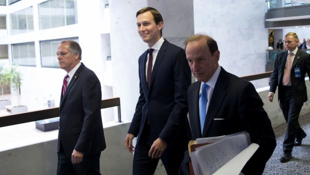 Jared Kushner, centre, leaves a Senate Intelligence Committee meetingin Washington on July 24. He said he had no improper contracts with Russian officials during the presidential campaign.