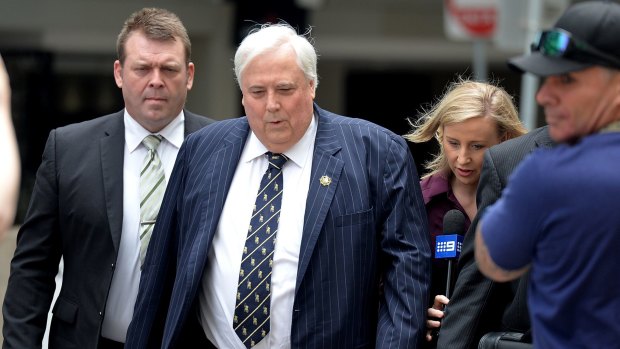 Clive Palmer arrives at the Federal Court to answer questions regarding the fall of Queensland Nickel on Thursday.
