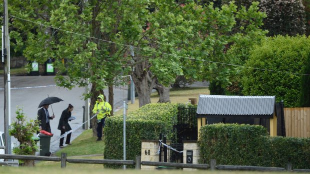 Police arrive at the house in Davidson in Sydney's north following the discovery of the four bodies.