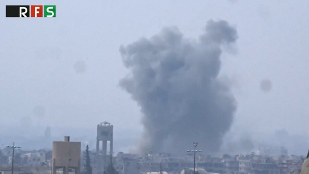 Smoke rises from explosions at Jobar, some two kilometres east of Damascus' Old City walls.