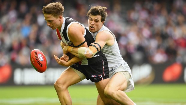St Kilda's Jack Billings, tackled here by Carlton's Lachie Plowman, starred with five goals.