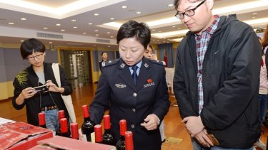 Bottles of counterfeit wine being sold on China's site, Alibaba, shown at a press conference in Shanghai on November 16, 2017. Pictures supplied by Alibaba