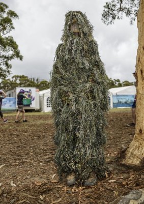 An example of the kind of "Ghillie" suit the attacker was described as wearing. 
