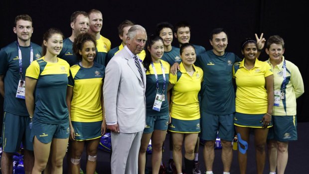 Prince Charles poses with members of the Australia badminton team in the lead up to the Games.