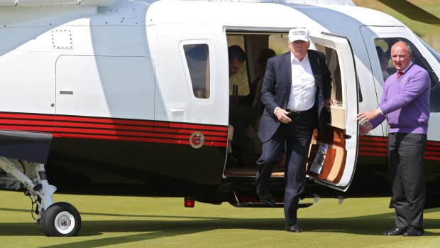 Donald Trump arrives at the Trump International Golf Links course at Balmedie.