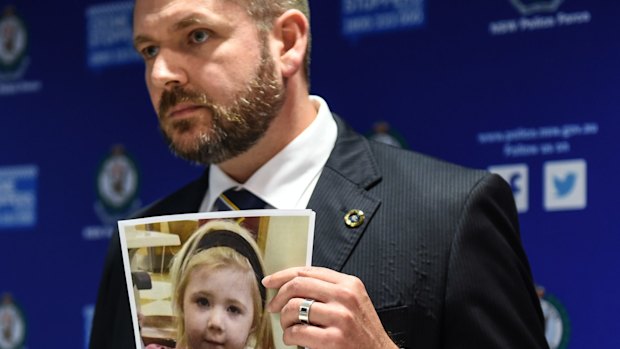 Police officers at Wednesday's press conference show an image of Khandalyce Kiara Pearce