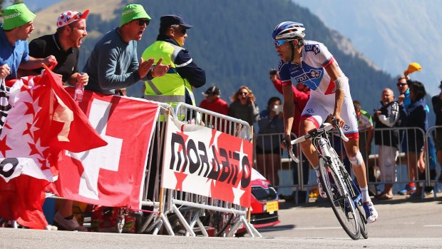 Thibaut Pinot of France and FDJ rides up the Alpe d'Huez .