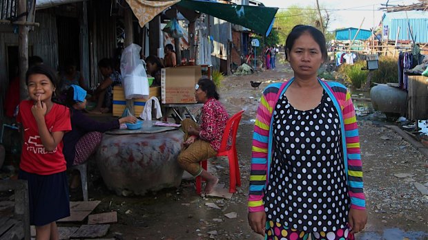 In the flood-prone squatter settlement village on the outskirts of the Cambodian capital, Hour Vanny says she was required under a contract to give birth by cesarean section. 