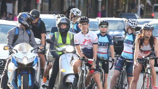 Cyclists in Sydney. One Chinese company wants to expand the ease of renting bikes in the city.