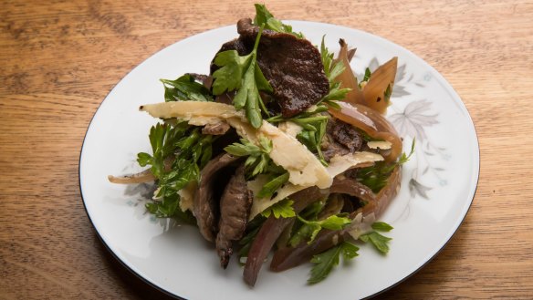 Beef heart and shallot salad.