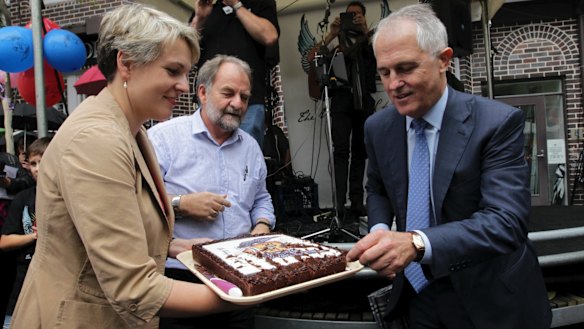 Ms Plibersek and Mr Turnbull pictured in 2014 while joining forces to celebrate a local event.