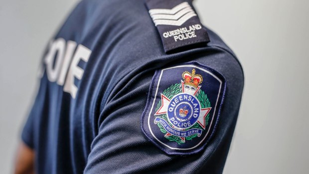 Queensland police are searching for two men who robbed and punched a woman in her home overnight.