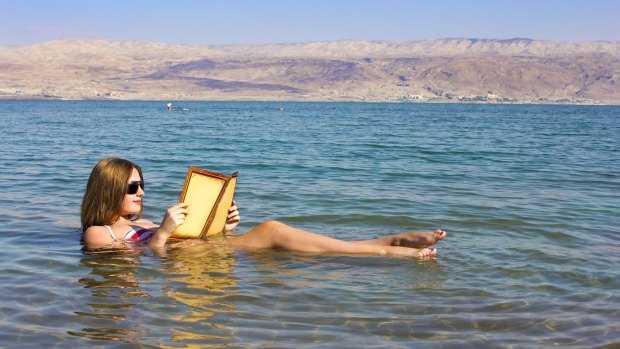 Floating away with a good read.