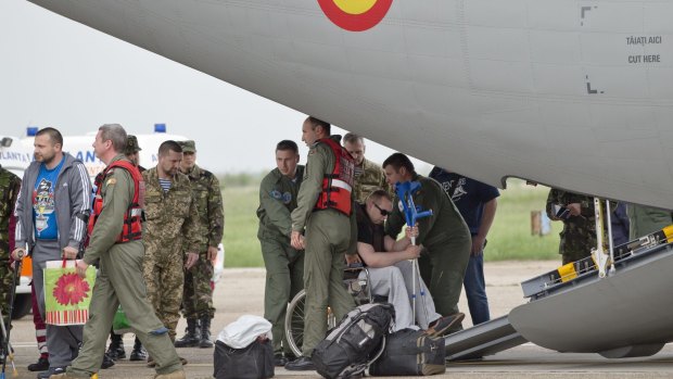 The effects of conflict in Ukraine continue to be felt – a  Ukrainian serviceman, injured during fighting with Russia-backed separatists in eastern Ukraine, in a wheelchair this week in Romania.