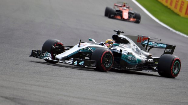 Slick handling: Lewis Hamilton steers his Mercedes around the Spa-Francorchamps circuit.