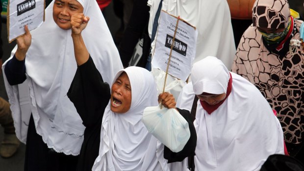 Clashes with police at a rally protesting against Ahok in Jakarta.