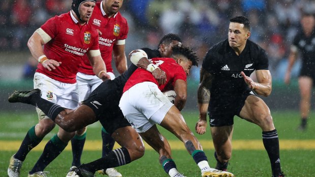 Red card: Sonny Bill Williams shapes up to make contact with Anthony Watson.
