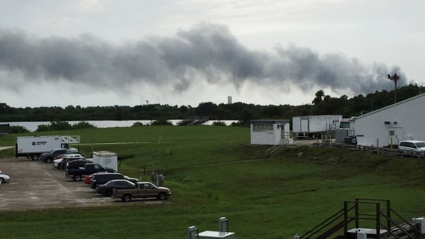 Smoke rises from a SpaceX launch site at Cape Canaveral, Florida.